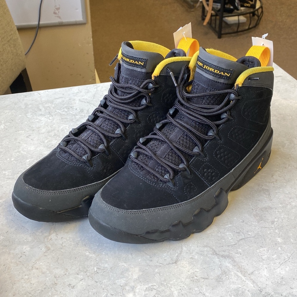 Jordan Black and Gold High-Top Sneakers
